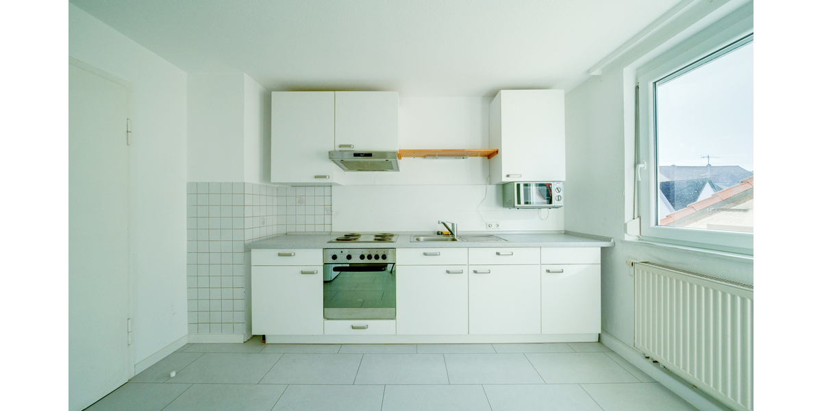 Wohn- und Geschäftshaus in der Münsinger Innenstadt - 3 Wohnungen und 1 Gewerbeeinheit - Wohn- & Geschäftshaus Münsingen | Angebot:18220329